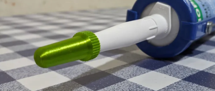 Lokk til silikon-/limdyse – hold tuben tett