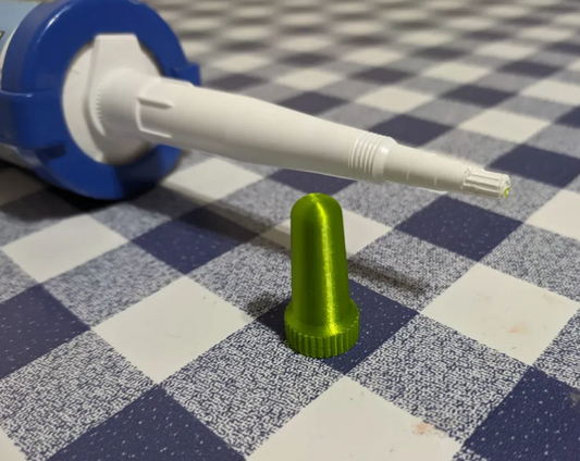 Lokk til silikon-/limdyse – hold tuben tett